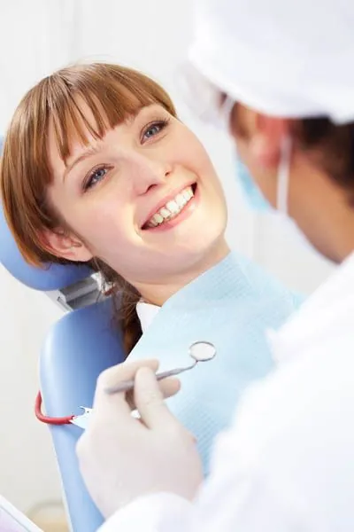 woman receiving dental care at Smile Studio Dentistry in Upland, CA