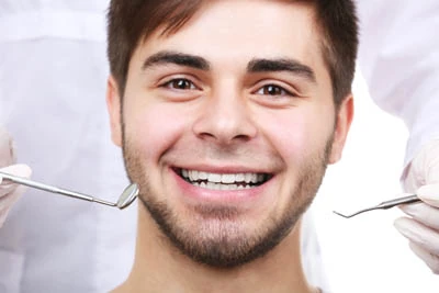 man receiving dental care at Smile Studio Dentistry in Upland, CA